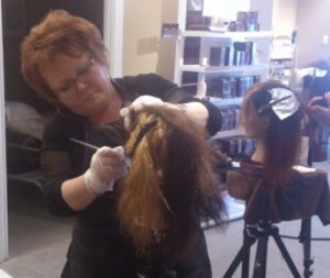 Shelley working with a hair donation